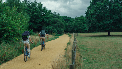 Cyclist Riding on an Open Road in Scenic Countryside