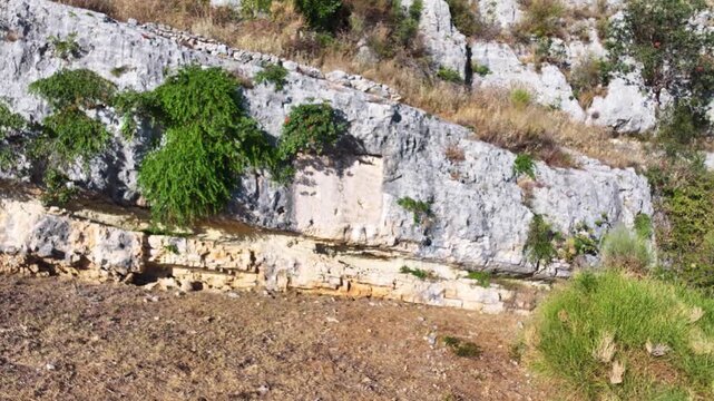 The ruin of antic Illyrian city Bylis, wall Latin inscriptions of Mark Valer Lolianus. Albania