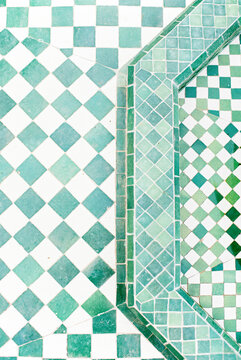 close up of white and green Moroccan tiles