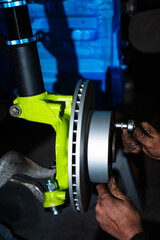 Front Suspension and Brake Disc Installation. Performance brake disc and strut assembly installed...