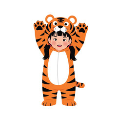 A young girl wearing a tiger costume, arms raised,  smiling happily.