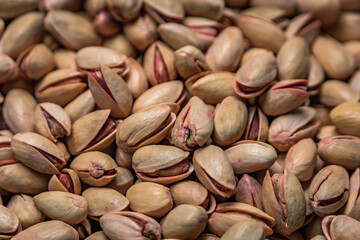 Whole pistachios in shells on display at a bazaar market stall, Istanbul, Turkey