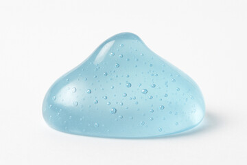 Side view of a translucent blue gel blob with a glossy surface and suspended air bubbles, resembling a soft mound, on a white background. Perfect for skincare or cosmetic advertising
