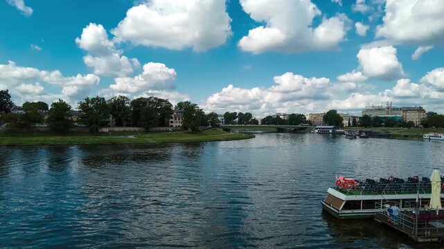 Time lapse of Visla Vistula river with tourist boats in Krakow, Poland