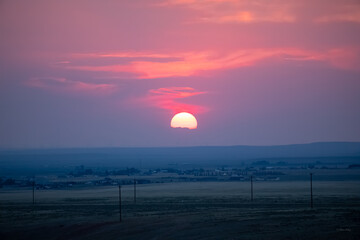 Striking pink blue sunset in Wyoming prairie