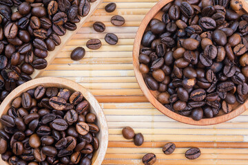 roasted coffee beans on a bamboo mat