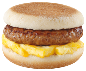 Delicious breakfast sandwich with sausage and egg on English muffin ready to eat
