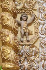 Arte sacro indígena, barroco (detalle) en el Templo de San Francisco Acatepec, Puebla, México.