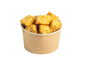 Crispy tofu (tahu crispy) in a paper bowl. Indonesian street food.
