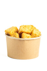 Crispy tofu (tahu crispy) in a paper bowl. Indonesian street food.