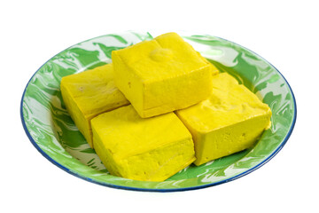 Tahu takwa (tahu kuning, tahu yellow tofu), traditional tofu from Kediri, East Java.This yellow color is tofu soaked with turmeric.