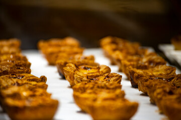 Classic Dessert: Neatly Arranged Portuguese Egg Tarts