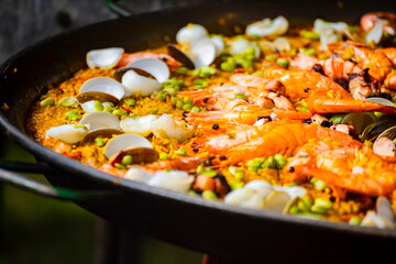 a generous and vibrant plate of seafood risotto