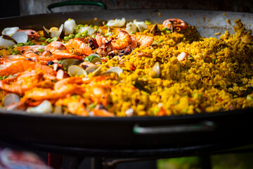 a generous and vibrant plate of seafood risotto