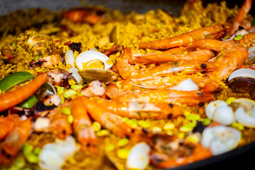 a generous and vibrant plate of seafood risotto