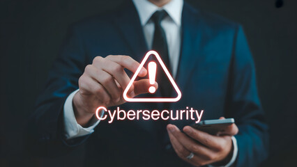 Cybersecurity professional points to digital warning sign on modern smartphone