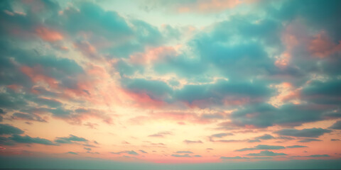Fototapeta premium Pastel sunset sky with soft clouds 