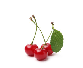 Fresh ripe cherries with green leaf isolated on white