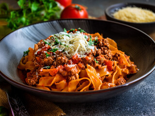 Hearty Close-up: Tagliatelle al Ragù (Bolognese) with Thick, Rich Meat Sauce

