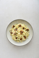 Mushroom pasta with cream parmesan cheese