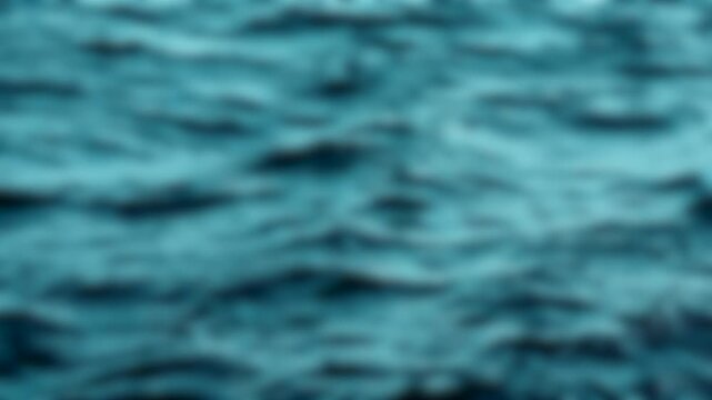 Blurry soft focus waves water movement background abstract