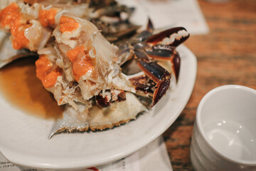 Raw crabs marinated in soy sauce with Chili Garnish  (Ganjang Gejang). Korean traditional food.
