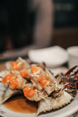 Raw crabs marinated in soy sauce with Chili Garnish  (Ganjang Gejang). Korean traditional food.
