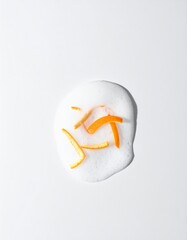 Refreshing citrus peel in vibrant foam creating a clean, natural skincare aesthetic