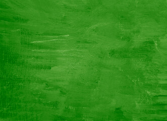 Abstract background with a textured, brushstroke style. Earthy green background, creating a warm, artistic feel. Vintage painting background, canvas cracked texture.