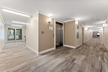 Hallway with a sign that says 