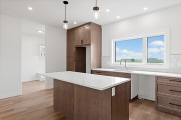 Kitchen with a white island and wooden cabinets