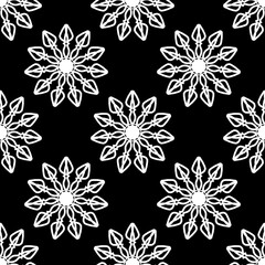 Elegant black and white seamless pattern with floral or snowflake motifs. Ideal for backgrounds, textiles, and digital art with a minimalist, symmetrical design.
