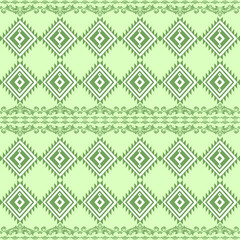 Abstract ikat pattern for seamless ethnic art in tribal and folk style. Print Aztec geometric ornament. Geometric pattern seamless color oriental.Design for fabric, carpet, wallpaper, clothing.
