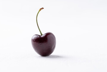 Fresh ripe cherry fruit on clean white background, minimal style, Healthy eating and seasonal