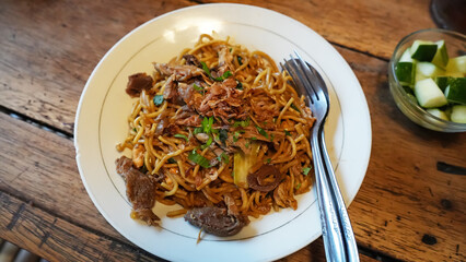 Mie Jawa or Bakmie Jawa, Javanese traditional noodle. Indonesian food
