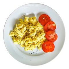 A plate of scrambled eggs with fresh tomato slices