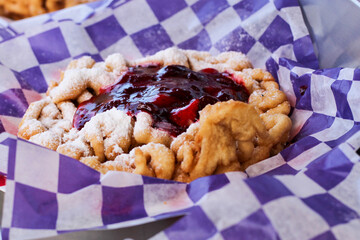 Close-Up of Freshly Made Fairground Funnel Cake with Powdered Sugar
