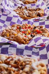 Close-Up of Freshly Made Fairground Funnel Cake with Powdered Sugar