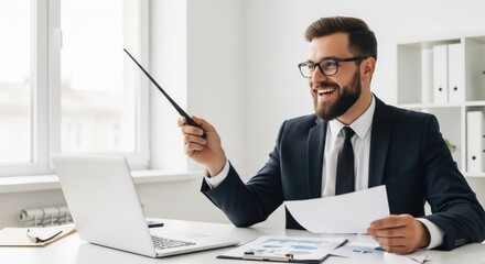 Smiling Businessman Presenting with Pointer and Laptop in Office.