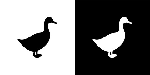 Two duck silhouettes, one black on white, the other white on black, facing opposite directions.