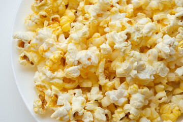 Tasty popcorn close up background top view