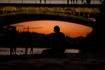 Silhouette of man watching a sunset
