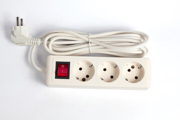 white extension cord featuring a power strip with three outlets and a red switch, set against a neutral white background.