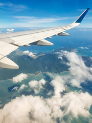 Obraz premium View from the plane. An airplane view of the coastline in Vietnam