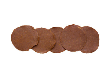 Fermented soybean discs, known as “Thua Nao,” a traditional Thai seasoning used to enhance flavor in Northern cuisine.