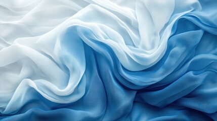 Obraz premium Smooth, flowing, ombre blue and white fabric drapes, studio shot