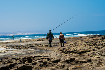 Two men going fishing in the open sea