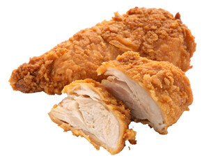 Crispy golden brown fried chicken pieces on a black background