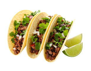 Authentic Mexican tacos with beef, onion, cilantro and lime wedges on white background.