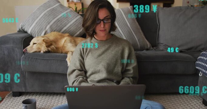 Starting sequence woman typing on laptop and analyzing floating currency symbols while dog sleeping